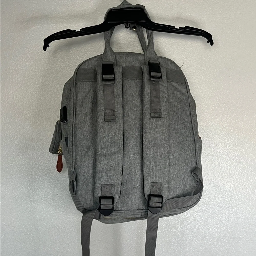 Gray Quilted Backpack with Brown Accents
